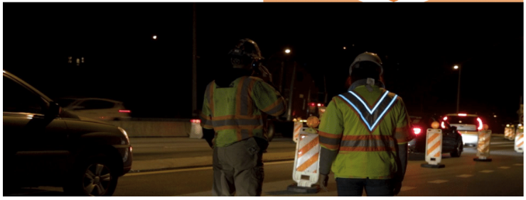 Worker wearing VisionVests patented design safety vest on the job site.